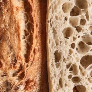 Crust and airy crumb of artisan sourdough