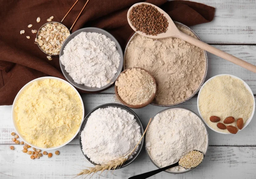 Assorted flours and grains in bowls